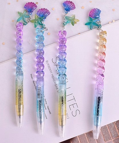 Ручка с блестками и водой