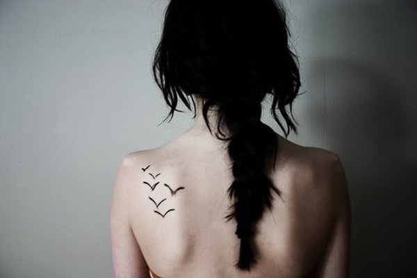 Шрамы от крыльев на спине