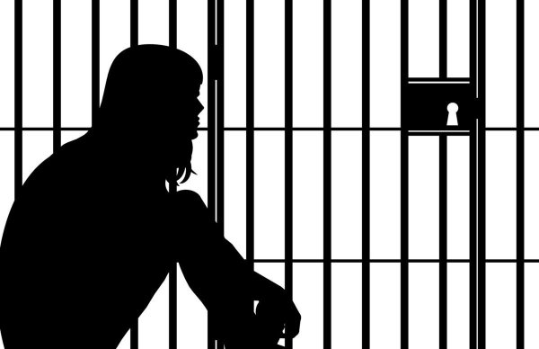 Силуэт за решеткой