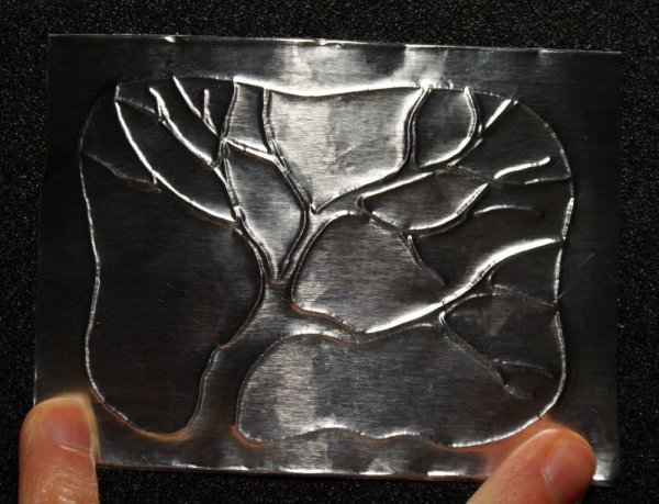 Рельефная металлопластика