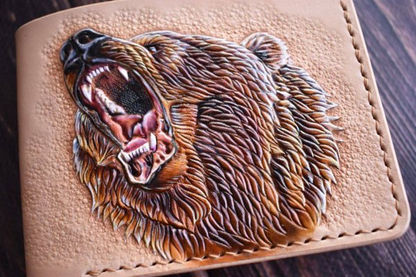 Тиснение на коже медведь