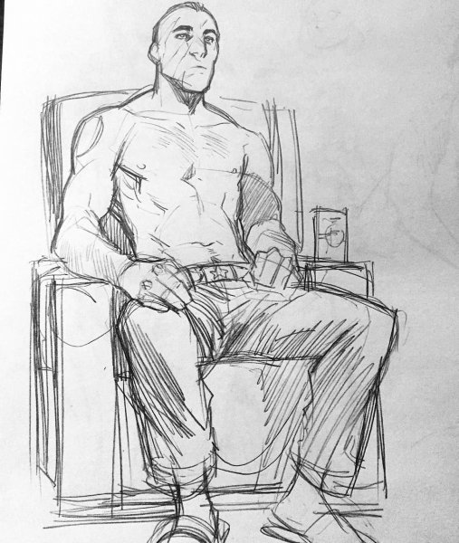 Человек сидит в кресле референс