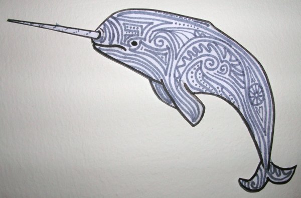 Дельфин с рогом единорога