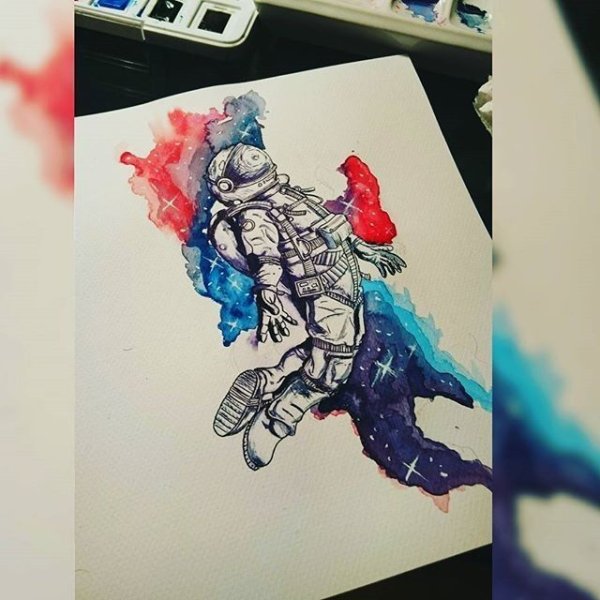 Космонавт акварель