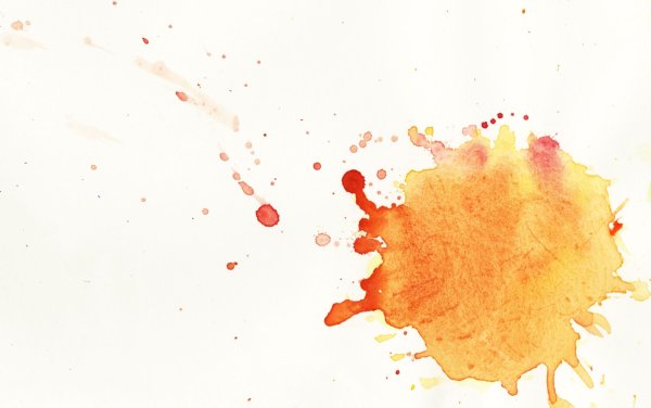 Взрыв красок на белом фоне