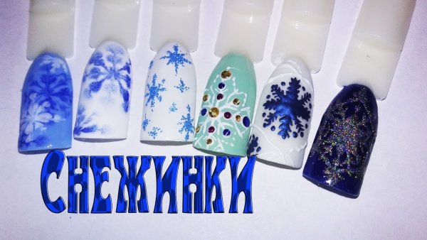 Акварельные снежинки на ногтях