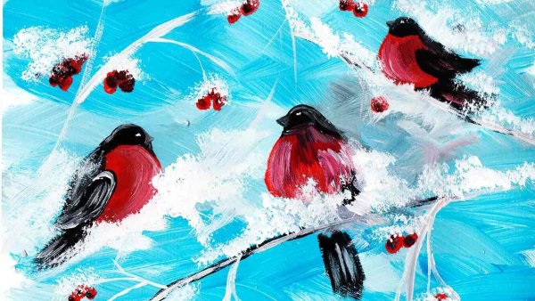 Снегирь на ветке рябины