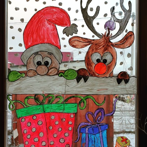 Новогодние рисунки на окнах