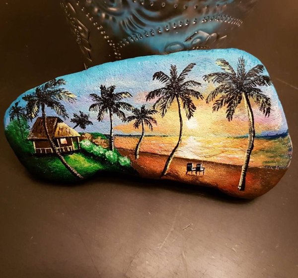 Котики на камушках