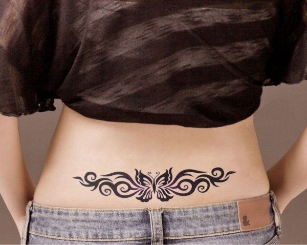 Тату трайбл на пояснице для девушек