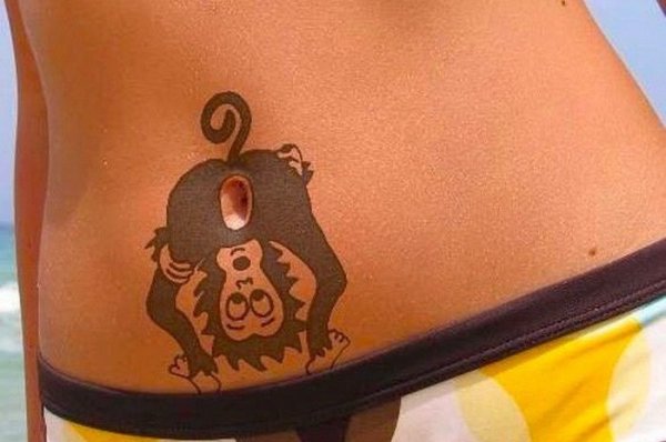 Прикольные тату на животе