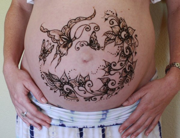 Татуировки на беременном животе