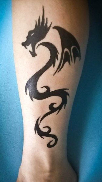 Аквагрим дракон на руке