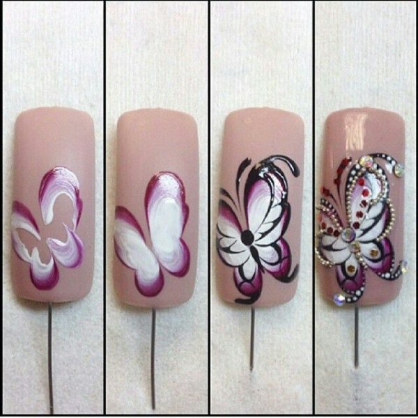 Рисование цветов на ногтях