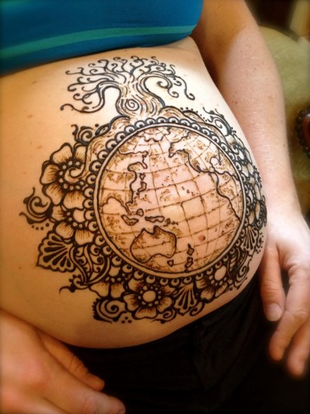 Тату Глобус на животе