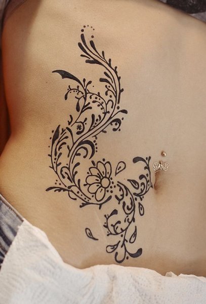 Тату узоры на животе