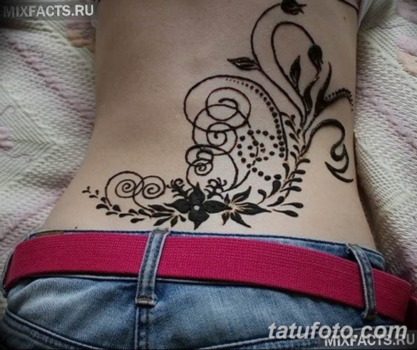 Татуировка на копчик мехенди