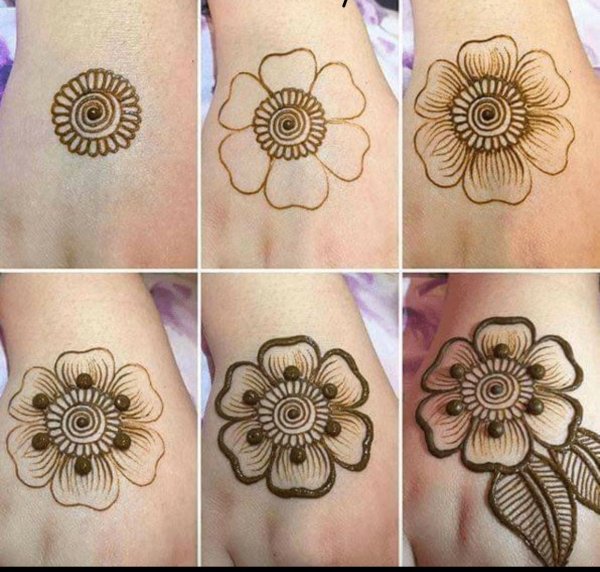 Цветочки хной на руке