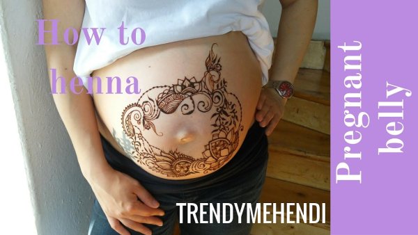 Рисунок хной на беременном животе
