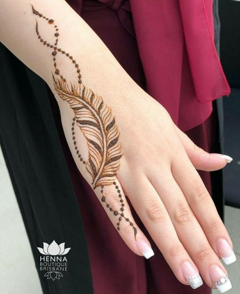 Тату хной перо