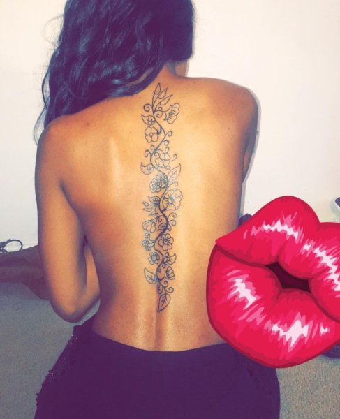 Тату на спине цветы вдоль позвоночника