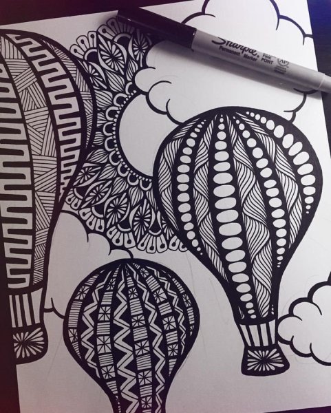 Узоры фломастером на бумаге