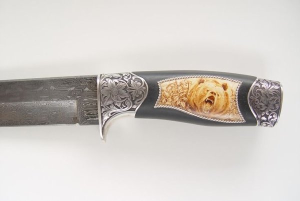 Рисунки на рукоятке ножа