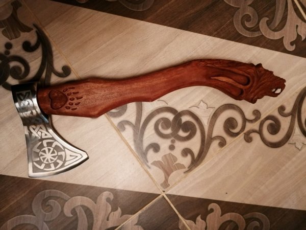 Резная ручка топора ёрмунганд