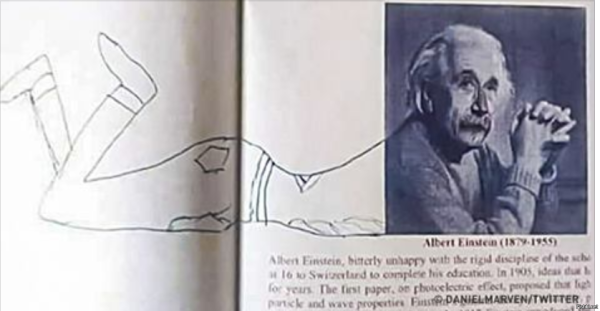 Разрисованные портреты в учебниках