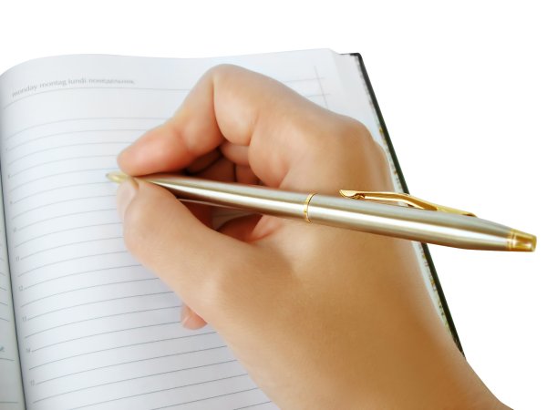 Рука с ручкой