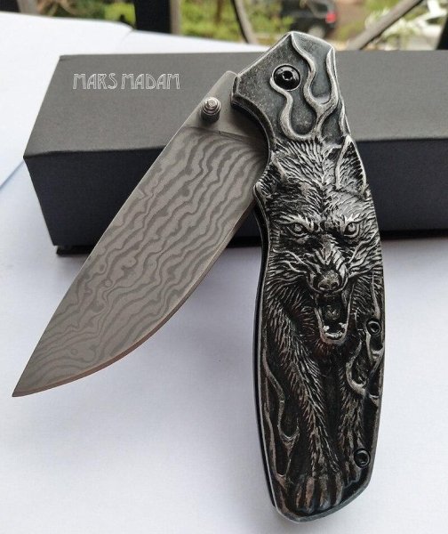 Гравировка на ноже лазером