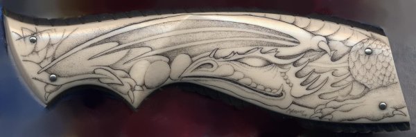 Рисунок на рукояти ножа