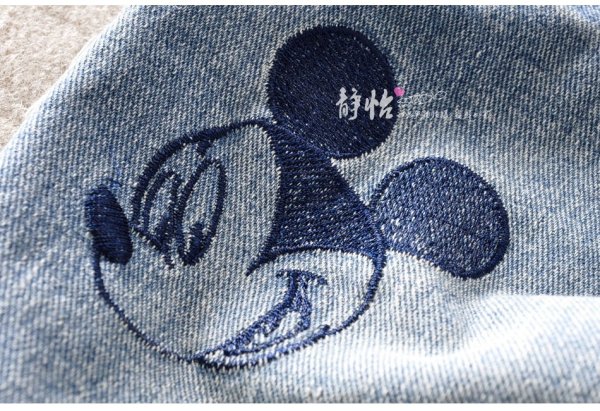 Вышивка на дырке джинс