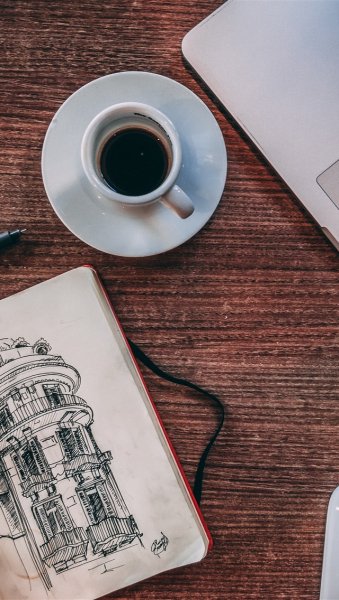 Блокнот с ручкой