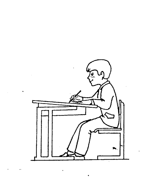 Мальчик сидит за партой