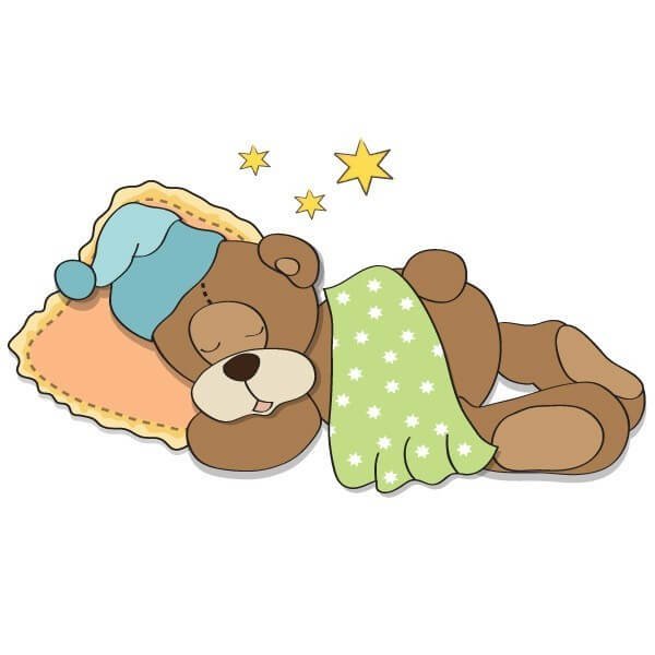 Медвежонок в кроватке