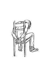 Связанный человек на стуле