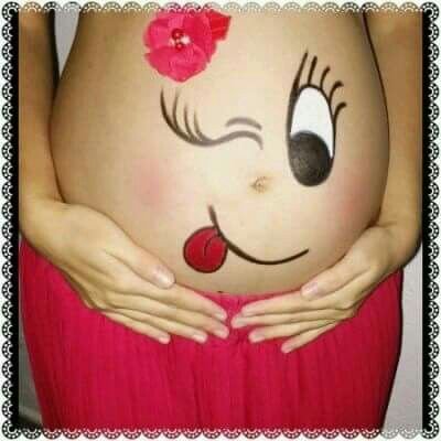 Мордочка на пузе беременной
