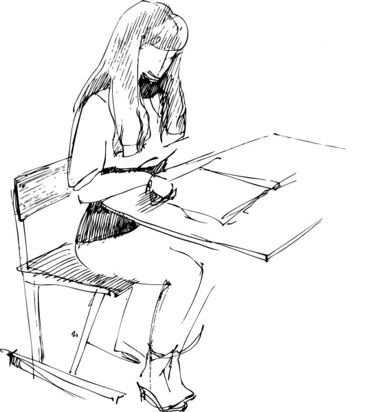 Человек сидит за партой