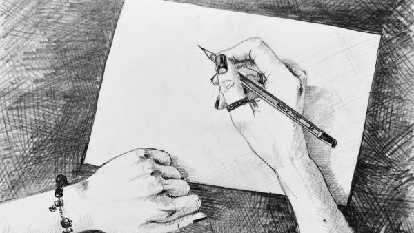 Рука художника с карандашом