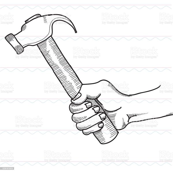 Молоток забивает гвоздь