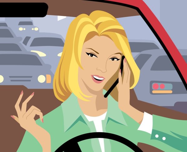 Зеленая мультяшная машинка с водителем