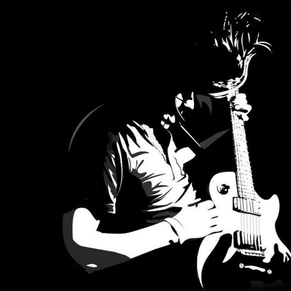 Гитарист на черном фоне