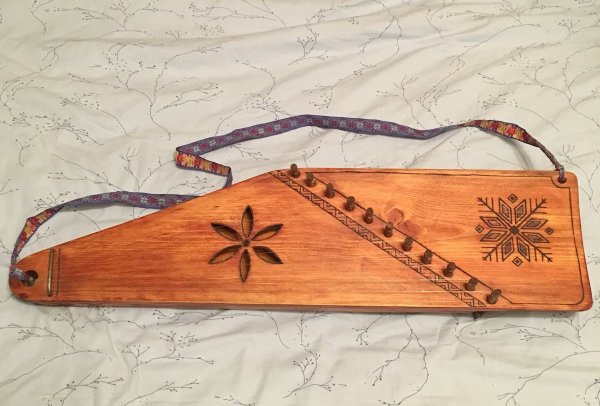 Кокле музыкальный инструмент