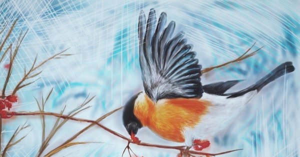 Снегирь с веточкой рябины в клюве