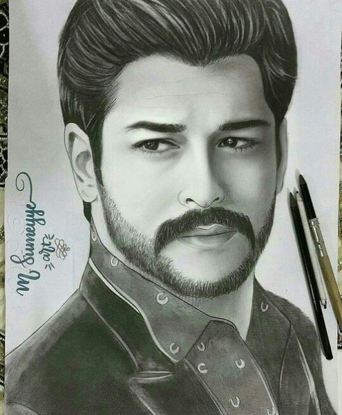 Портрет Бурака Озчивита