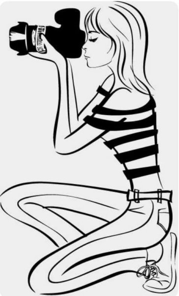 Девушка с фотоаппаратом