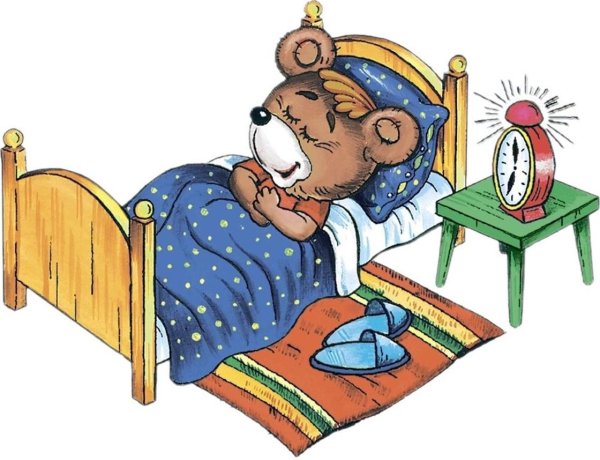 Медвежонок спит в кроватке