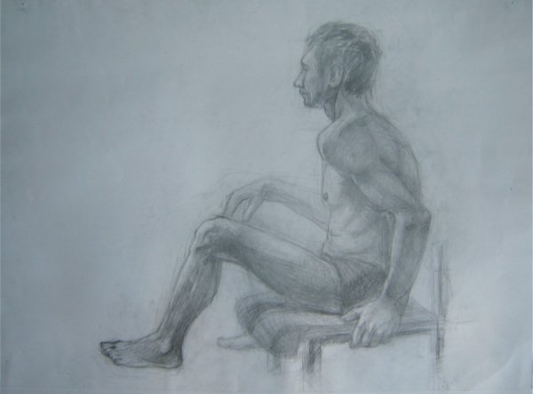 Фигура сидящего человека