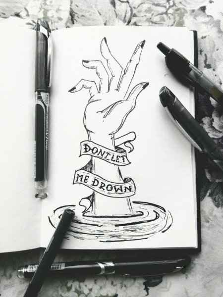 Рисунки чёрной ручкой в скутчбуке